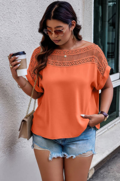 Plus size orange batwing blouse with boho lace detail and printed pattern