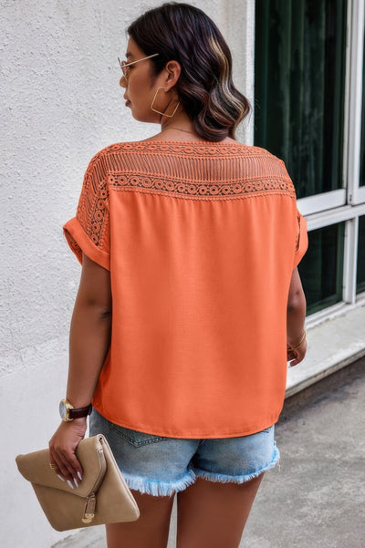 Plus size orange batwing blouse with boho lace detail and printed pattern