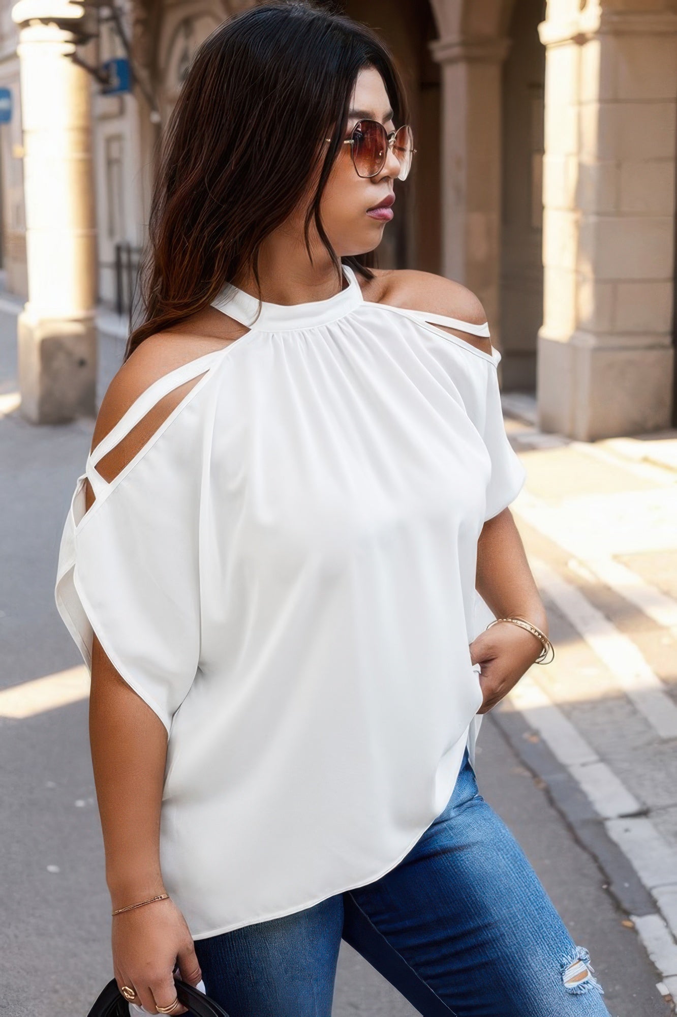 Plus size white halter top with cold shoulders and flowy batwing sleeves