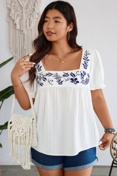 Plus size white floral blouse with puff sleeves and square neckline